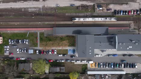 aerial view of railway station with arriving train