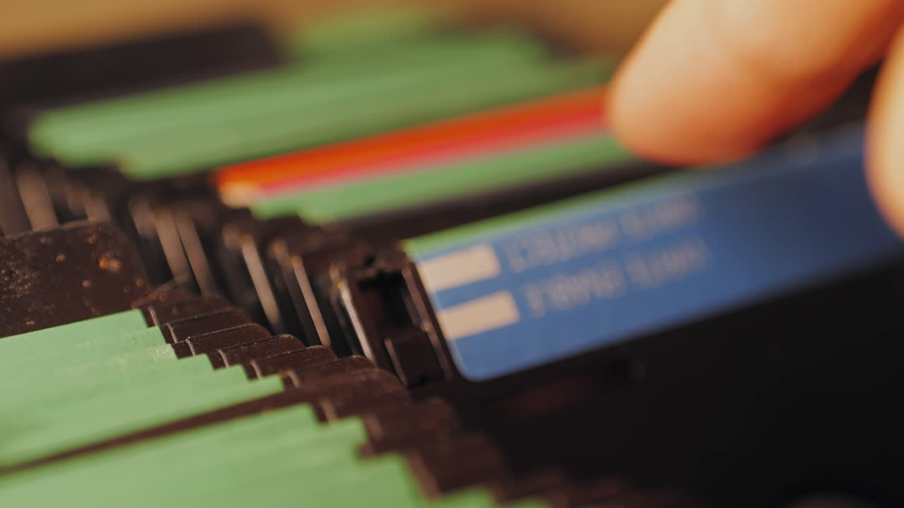 Using diskette for old computer. Music recorder, playing retro computer games. Vintage device for office, obsolete technology. . High quality 4k footage