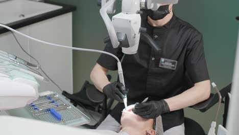 dentist examining a patient's teeth in the dentist.