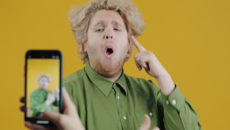 man taking a funny selfie video call
