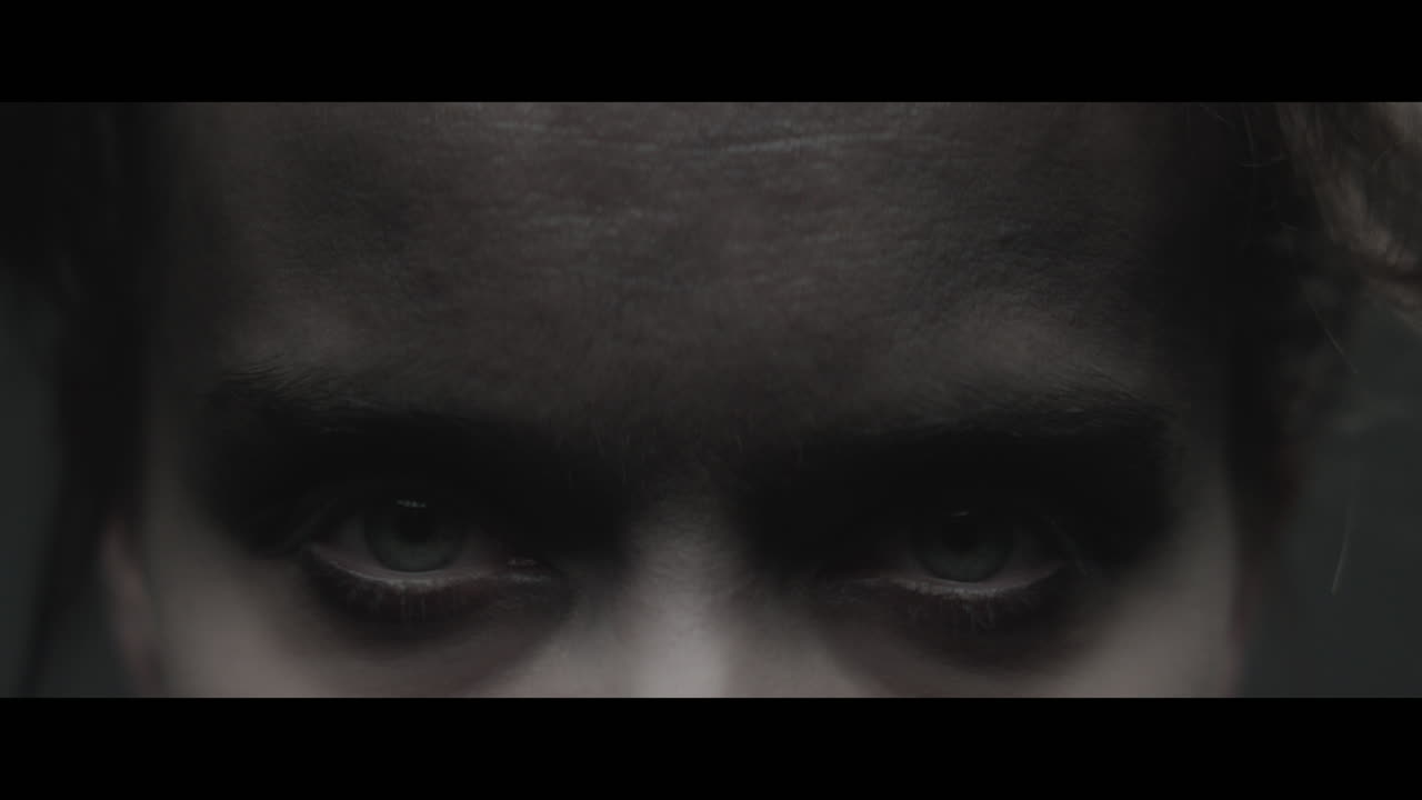 A woman dressed as mother nature rise her head