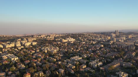 israel, jerusalem colorful sky over city buildings view, drone aerial shot