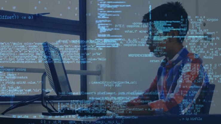 Databehandling mod en dreng, der bruger bærbar computer