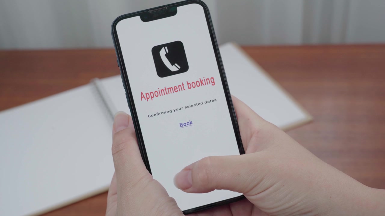 Closeup of a person holding a smartphone with an AI information interface confirming appointment booking as a thumb pauses over Book.