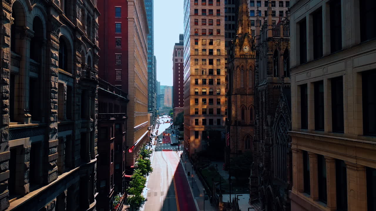 Gorgeous buildings along Sixth Avenue in downtown Pittsburgh, Pennsylvania, United States. Drone footage approaching the First Presbyterian Church
