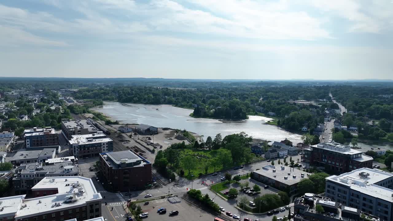 Drone view of lake in Portsmouth, New Hampshire on a cloudy summer day