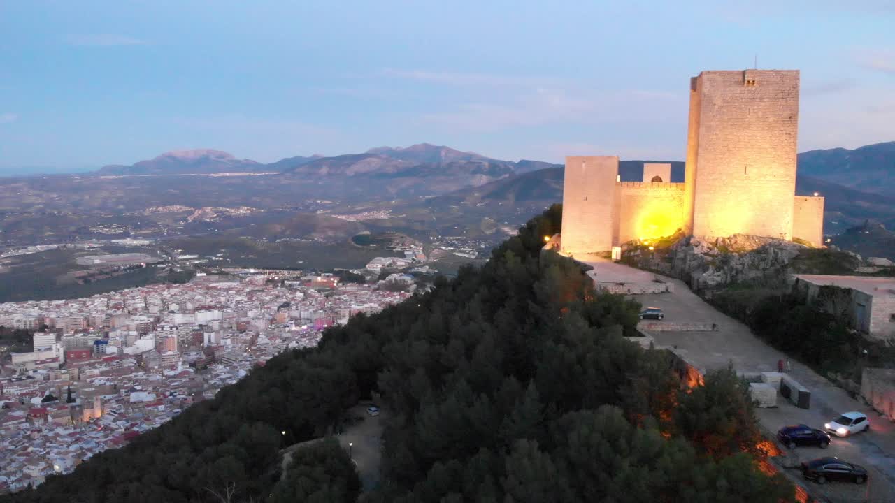 Jaen's Castle Saint Catalina Castle Spain shoot with a drone at 4k 24fps showing the exterior and the city from multiple points on a afternoon in December.