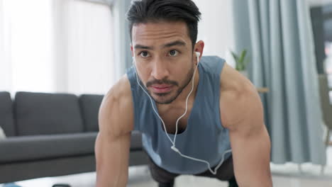 man doing exercise for fitness workout with music