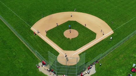 Aerial-rotating,-top-down-view-of-little-league-baseball-game