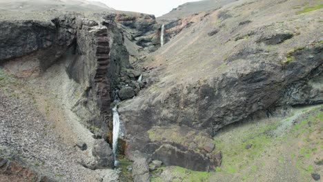 Cascading-waterfalls-of-the-Hvannagil-golden-canyons-near-Stafafell-in-Iceland-during-summer