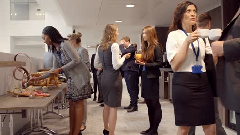 delegates at lunch buffet during conference break