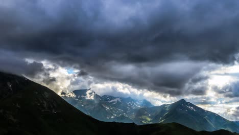 timelapse in the mountains, in the french pyrénées. with a lot of clouds and some snow in the background