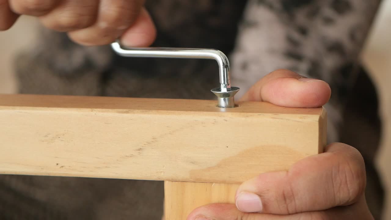 Assembling Wooden Furniture with Screwdriver
