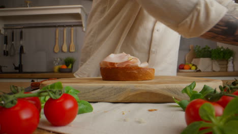 making a delicious ham and bread tart