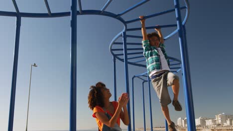 mother and son having fun at playground