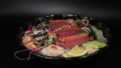 sushi assortment arranged on a large platter.