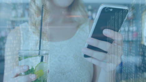 Holding smartphone, person viewing cityscape with digital data animation overlay