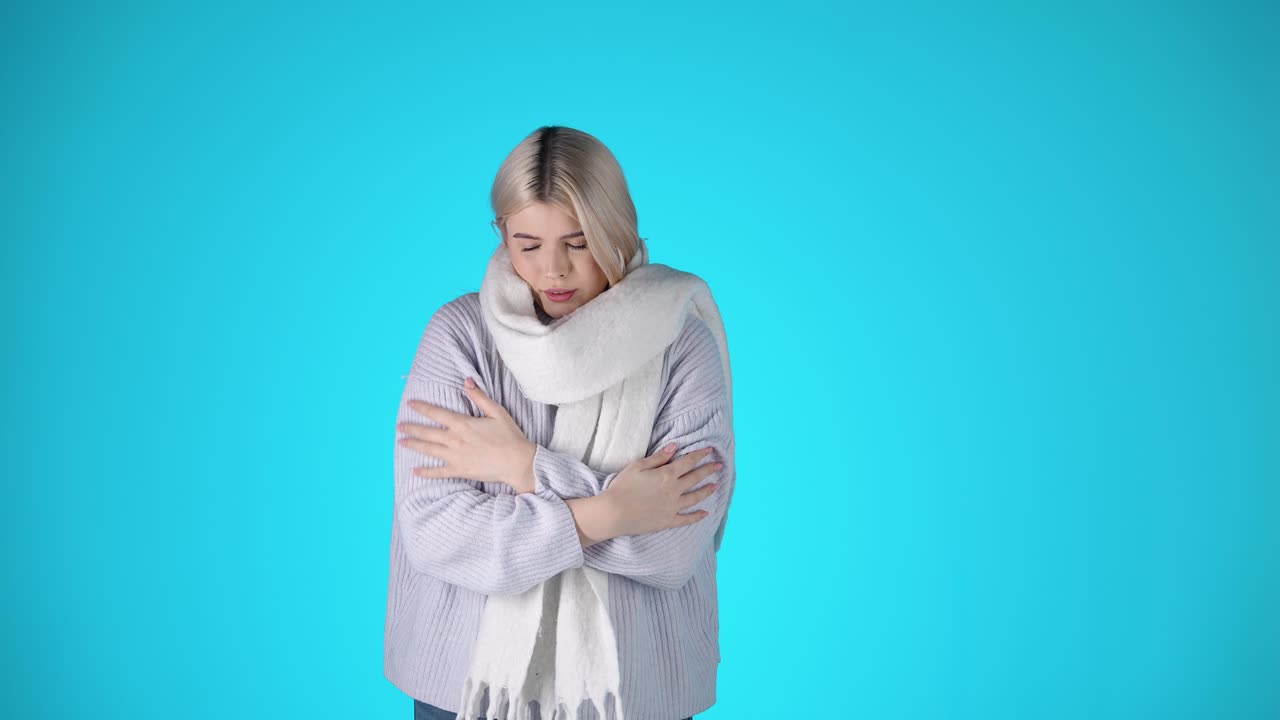 Woman Shivering in Cold Weather