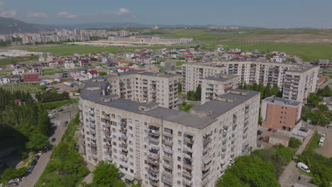 ascending shot of rundown apartment complexes in downtown georgia