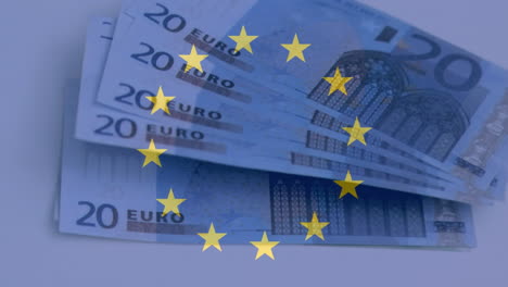 Estrellas-Amarillas-Girando-Contra-Billetes-En-Euros-Sobre-Una-Mesa