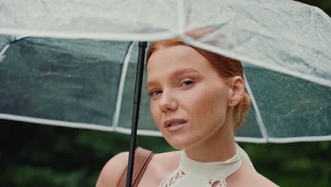 woman with umbrella in the rain
