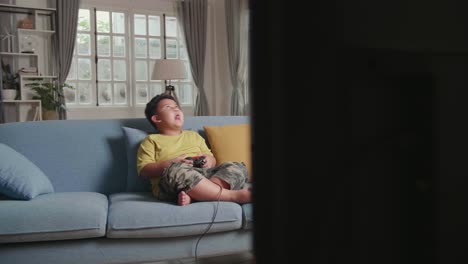 asian young boy gamer shaking his head, impossible gesture