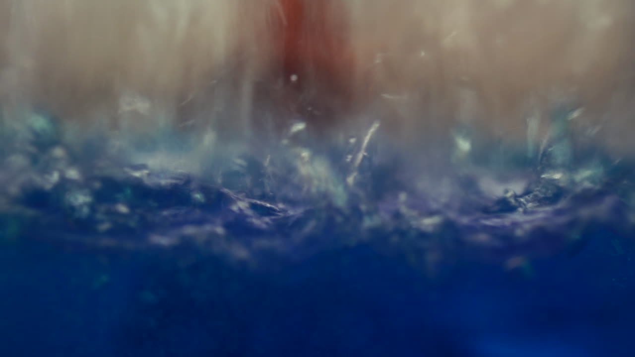 salpicaduras de agua en líquido azul