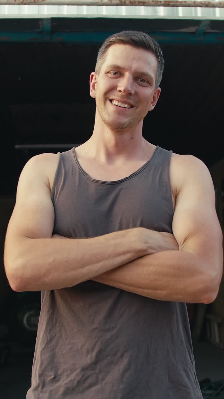 Confident Worker in a Garage