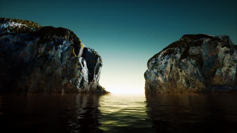 rocky cliff at cold sea water