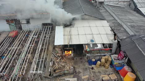 burning debris and smoke in urban setting