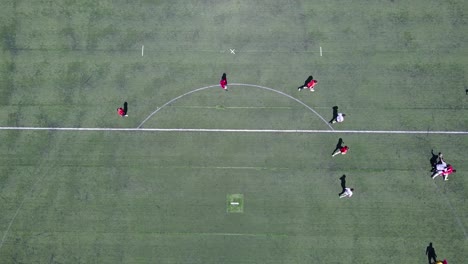 aerial shot over an amateur soccer match on a soccer field 1