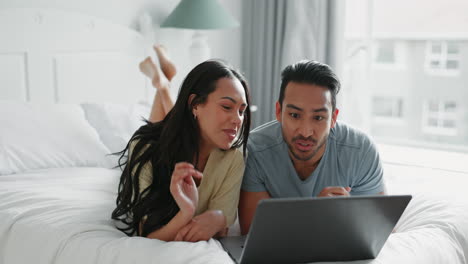 Couple,-laptop-and-relax-on-bed-in-communication