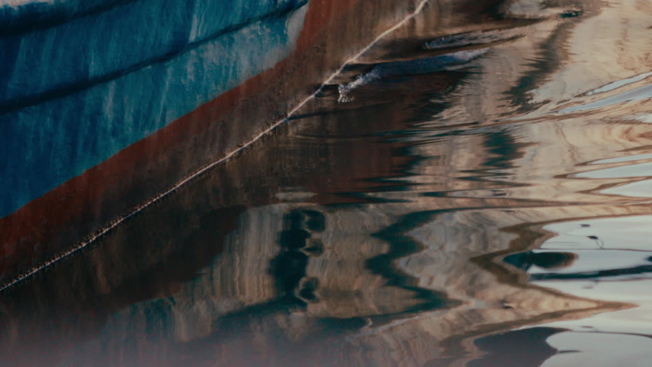 Reflection of a boat on water