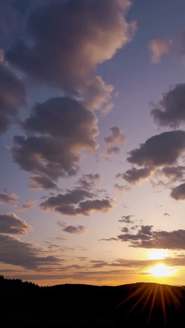 sunset over mountains and forest