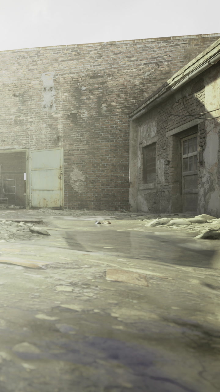 Old building with water on ground in an urban area during daylight hours