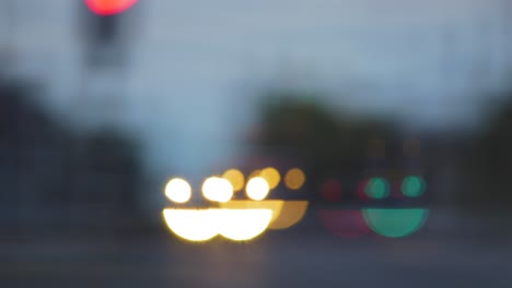 colorful smiley face emoji bokeh from moving car and traffic lights at the evening, social media emoji background concept