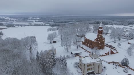 red brick church in winter