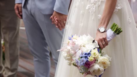 real butterfly on beautiful bride's bouquet