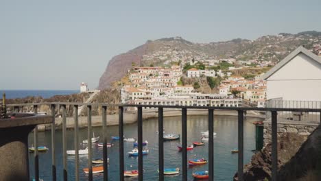 picturesque coastal town with colorful boats