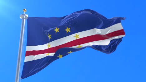 flag of cape verde waving at wind in slow with blue sky, loop