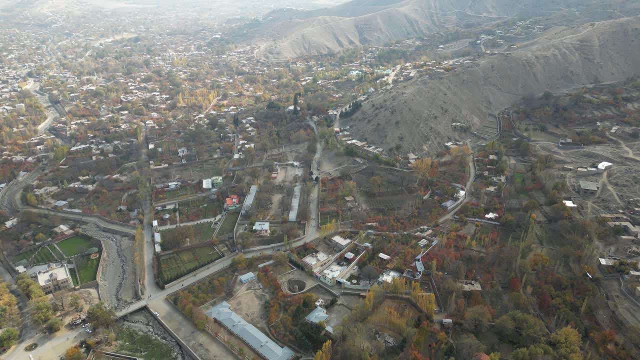 Aerial drone view of mountain villages over Paghman region near Kabul, Afghanistan