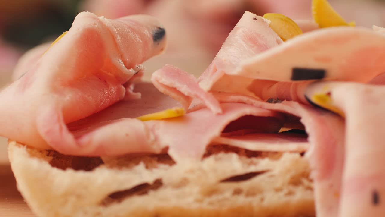 Close-up of a sandwich with sliced ham