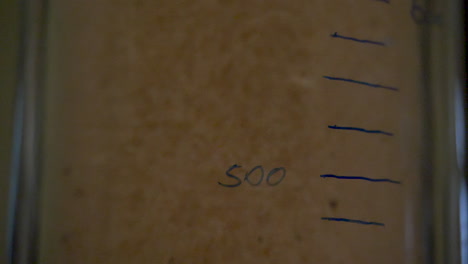measuring liquid levels in a graduated cylinder