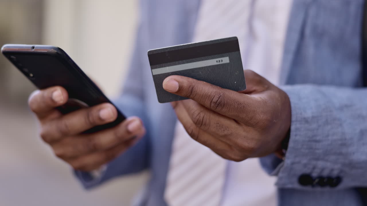 Black man, hands and phone with credit card