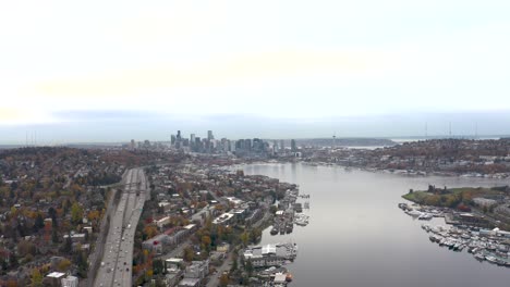 aerial view pushing over lake union towards downtown seattle