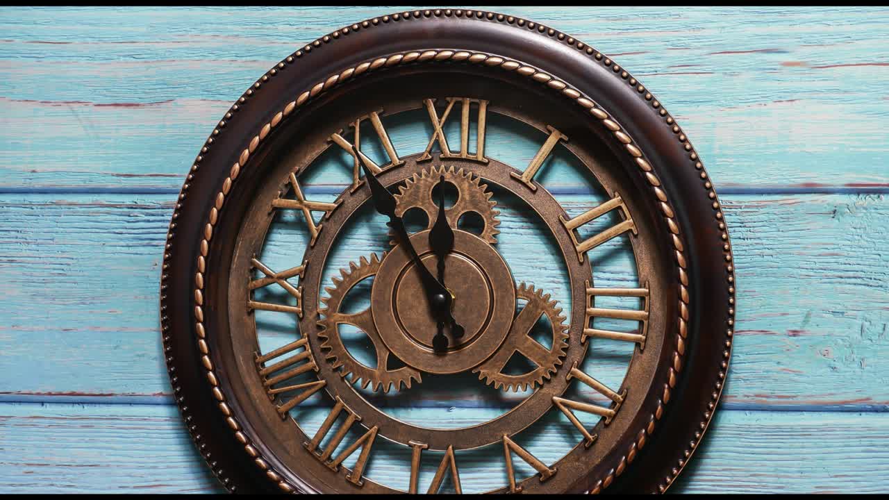 Zoom in close up time-lapse of Vintage clock face with Roman numerals on blue wooden background. Time lapse 4k