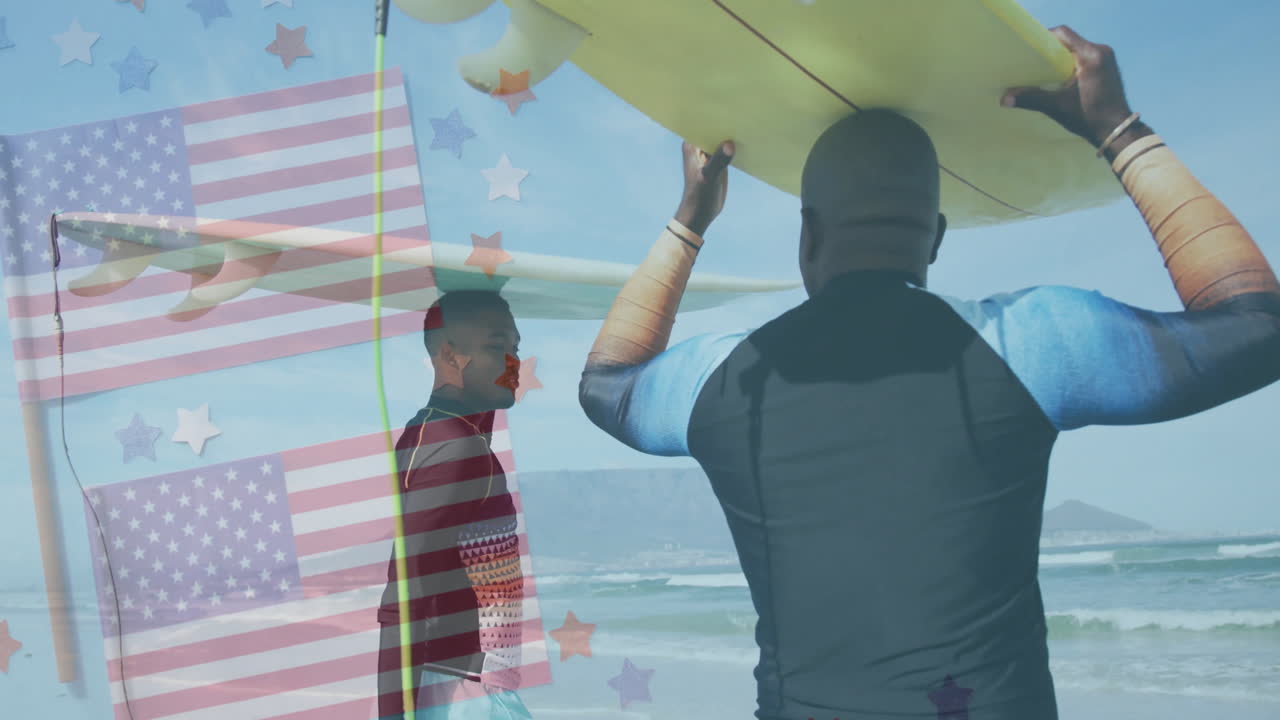 Surfer carrying board on beach with American flag and stars animation overlay