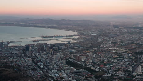 aerial of cape town city center in the evening with the harbour in the background in south africa