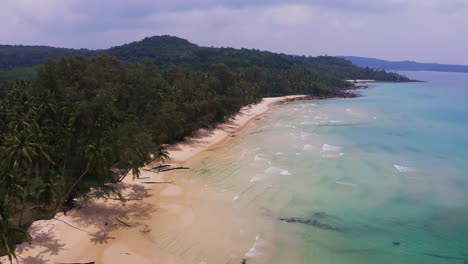 tropical sandy beach paradise of koh kood in thailand with sea waves