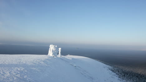 snowy mountaintop with ice formations and helicopter